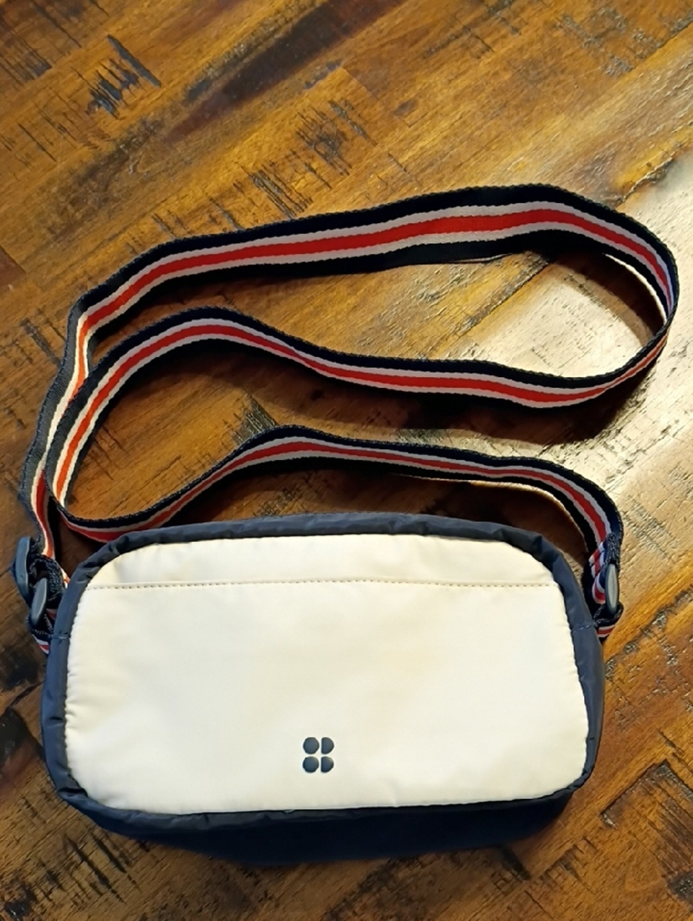 Sweaty Betty Crossbody Bag in Cream with Navy Trim